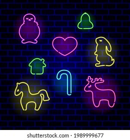 Set of neon Christmas decoration. Decorative Christmas toy bright signboard, light banner. Vector illustration.