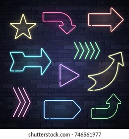 Set of neon frame star arrows pointers signs light electric banners glowing on black brick wall background, vector illustration