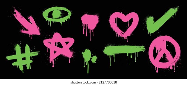 Set of neon green and pink graffiti spray. Collection of shapes, eye, heart, star and dot with spray texture. Shining elements on black background for banner, decoration, street art and ads.