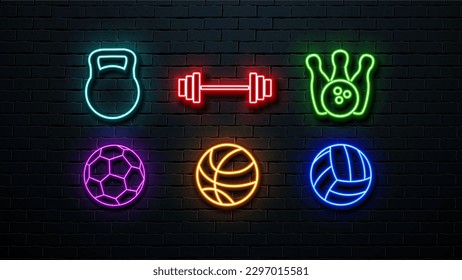 A set of neon icons: a football ball, a volleyball ball, a basketball ball, a kettlebell, dumbbells and bowling pins with a bowling ball on a wall background.