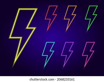 a set of neon lightning bolts. A collection of insulated zippers glowing in the dark with bright colors, yellow, red, blue and green on a dark background for a design template isolated multicolored 