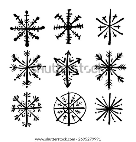 Set of New Year brush stroke or chalk ornate texture snowflakes icons, Christmas patterned black brush hand-drawn isolated elements on white background. Scandinavian Norwegian simple winter print