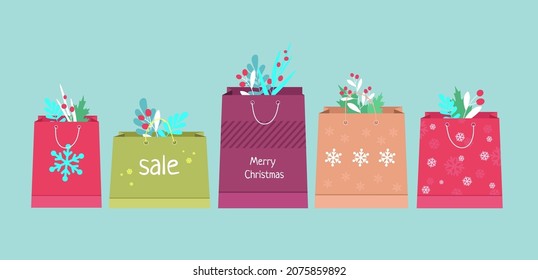 Set of New Year's shopping bags. Christmas shopping. Packages and gifts. Packages with snowflakes and winter New Year's botany. Twigs and berries. Flat style insulated packaging.