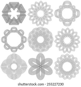 Set of nine abstract vector ornamental black circular stencils on a white background