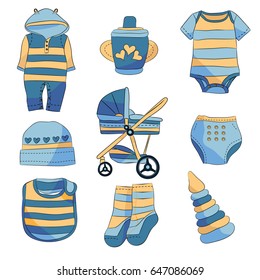 Set of nine baby boy items on white background