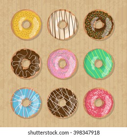Set of nine bright tasty vector donuts illustration on the cardboard box background. Doughnut icon in cartoon style for donuts menu in cafe and shop.