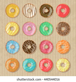 Set of nine bright tasty vector donuts illustration on the cardboard box background. Doughnut icon in cartoon style for donuts menu in cafe and shop.