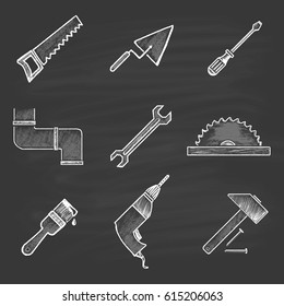  A set of nine building icons in a flat style: saw, spatula, screwdriver, sewer, wrench, circular saw, paint brush, drill, hammer and nails. Painted chalk on a black board.