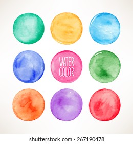 set of nine colorful watercolor round spots