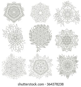 A set of nine contour circular ornaments. Vector Flowers anti-stress. Vector set