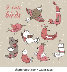Set of nine cute winter birds. Brown, red and white colored.