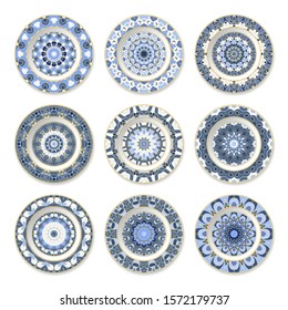 Set of nine decorative plates with a circular colored pattern, top view. White background. Vector illustration.