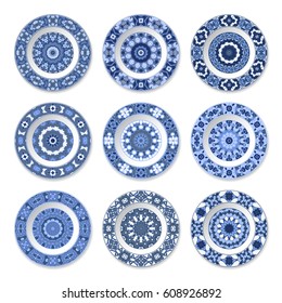 Set of nine decorative plates with a circular blue pattern, top view. White background. Vector illustration.