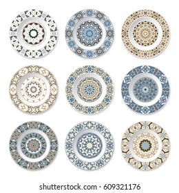 Set of nine decorative plates with a circular colored pattern, top view. White background. Vector illustration.