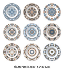 Set of nine decorative plates with a circular colored pattern, top view. White background. Vector illustration.