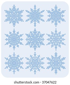 Set of nine different highly detailed snowflakes