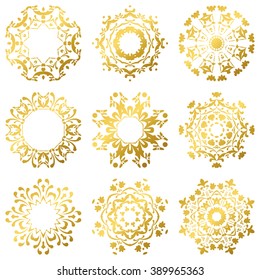 Set of nine golden circular patterns or mandalas in east Mediterranean style on isolated background