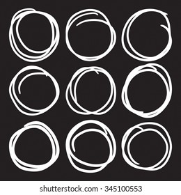 Set of nine hand drawn scribble circles and highlights,  diagrams design elements on black.