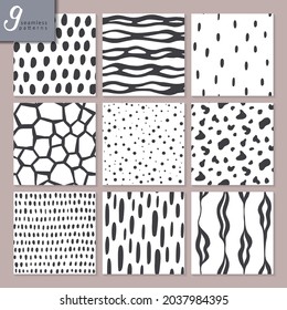 Set of nine hand drawn seamless abstract patterns with dots, stripes textures. Trendy vector endless background collection in black and white colors.