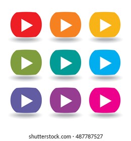 A set of nine movie buttons in rainbow colors 