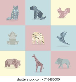 Set of nine origami paper animals made with different textured papers.