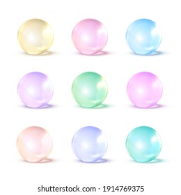 Conjunto de nueve bolas de vidrio realistas vectoriales de diferente color con sombra aislada en fondo blanco. 3.ª Esferas Irlandesas.