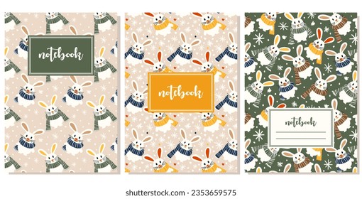 set of notebook covers with cozy winter illustrations with bunnies in scarves and snowflakes in flat style with simple shapes