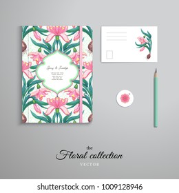 Set of notebook, pencil, tag and card. Floral pattern of snowdrops. Snowfall on backdrop.