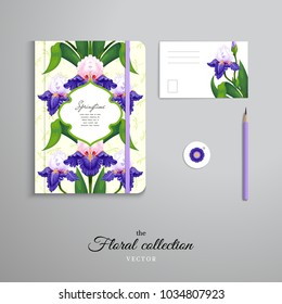 Set of notebook, pencil, tag and card. Floral pattern of irises. Dragonflies on backdrop.