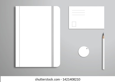 Set of notebook, pencil, tag and card. Mock-up for design