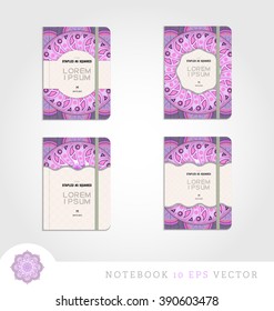 Set of notebooks with mandala background