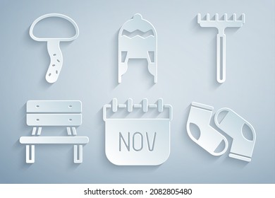 Set November calendar autumn, Garden rake, Bench, Socks, Winter hat and Mushroom icon. Vector