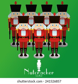 a set of nutcracker soldiers on a green background