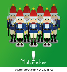 a set of nutcracker soldiers on a green background