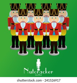 a set of nutcracker soldiers on a green background