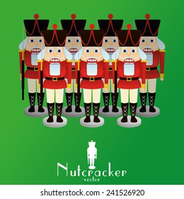 a set of nutcracker soldiers on a green background