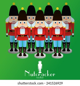 a set of nutcracker soldiers on a green background