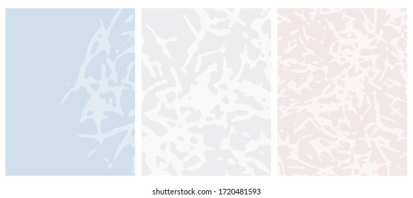 Set o 3 Abstract Geometric Layouts. Irregular Hand Drawn Scribbles on a Light Blue, Beige and Light Gray Backgrounds. Funny Simple Creative Design. Infantile Style Spatter and Mesh Graphic.
