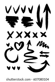 Set of objects for design. Vector image of abstract arrows, hearts, spots, crosses and daws. Hand drawing.