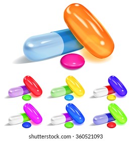 Set of oblong and elliptical multicolored capsules and round pills with shadows on white background