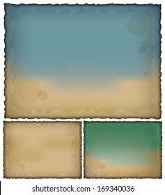set of old blue, brown and green paper with stains and rough edges. vector.