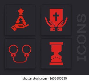 Set Old hourglass, Hand holding money bag, Oath on the Holy Bible and Handcuffs icon. Vector