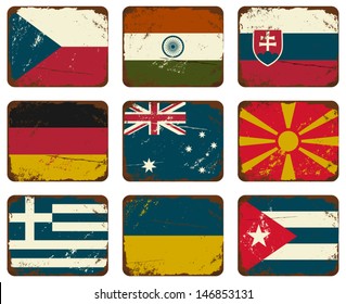 A set of old rusty tin signs with flags.