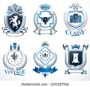 Set of old style heraldry vector emblems, vintage illustrations decorated with monarch accessories, towers, pentagonal stars, weapon and armory. Coat of Arms collection.