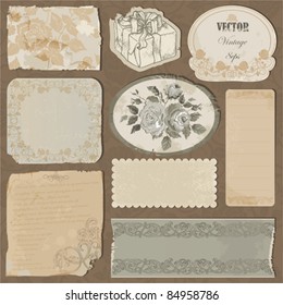 Set of the old torn paper, labels and pieces of wallpaper with decorative elements and roses