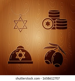 Set Olives branch, Star of David necklace on chain, Jewish kippah with star of david and Jewish coin on wooden background. Vector