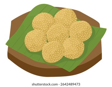 Um conjunto de onde, redondo de sementes de gergelim cobertas de bolas de arroz glutinoso, fica em uma tábua de madeira com folhas de banana.