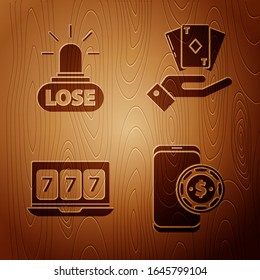 Set Online poker table game, Casino losing, Online slot machine with lucky sevens jackpot and Hand holding deck of playing cards on wooden background. Vector