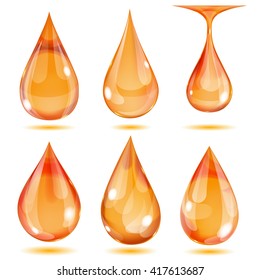 Set of opaque orange drops on white background