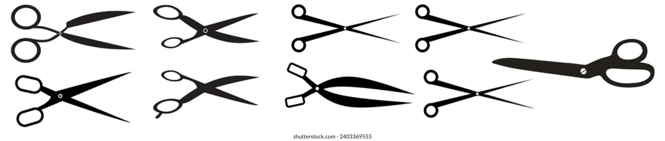 set of open black scissors on white background.